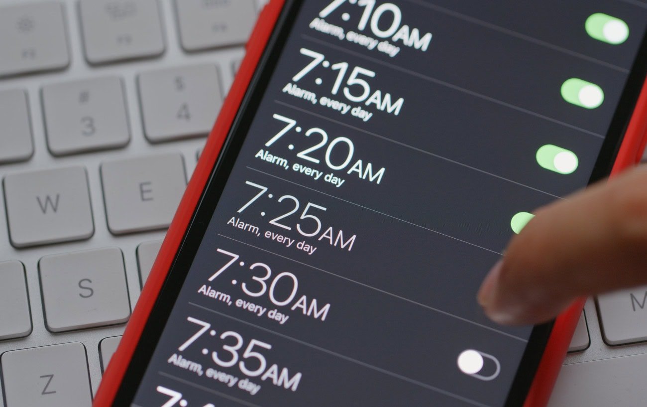 Sleep: The Essential Part of Training That Most Runners Overlook 5 a finger pointing at a screen