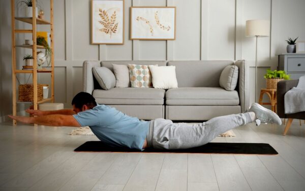 The Superman Exercise Guide: How To, Benefits, + 2 Beginner Variations