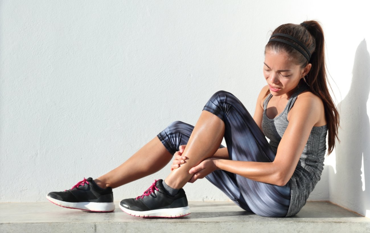 woman with sore leg muscles