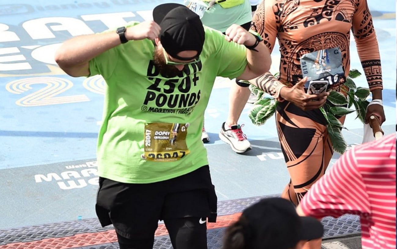 christopher hasty crossing the finish line