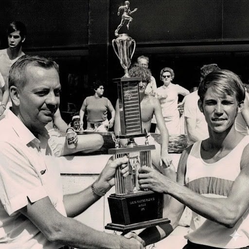 Jef Galloway holding a trophy. 