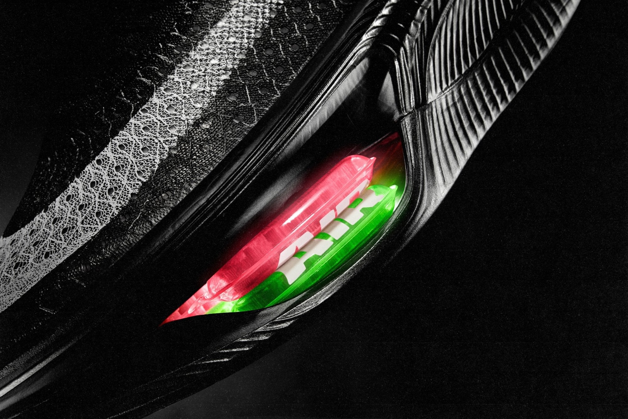 Close-up of the Nike Apex midsole window showing two Air Zoom units stacked one on top of the other