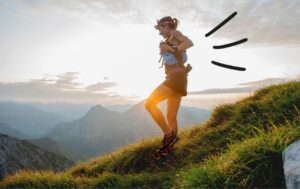 woman running downhill in ultramarathon